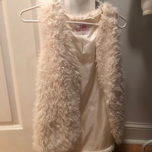 Fluffy white vest